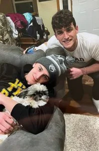 Brothers and puppy